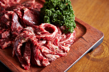 raw beef on a cutting board 
