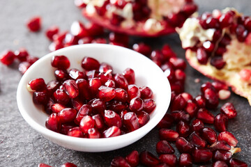 pomegranate seeds in a bowl
