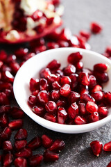 pomegranate seeds in a bowl