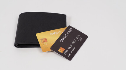 Credit card Black and gold color in black on wallet isolated on white background..