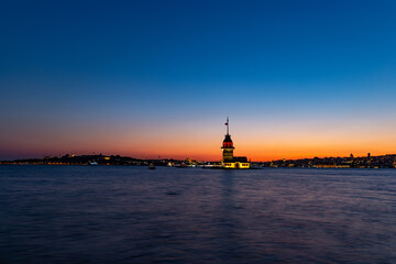 Sunset over Bosphorus with famous Maiden's Tower. Istanbul, Turkey