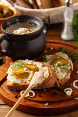 Sandwich with lard and pickled cucumber. Traditionally rendered lard with cracklings and onion.