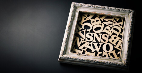 The word 'sns' between wooden letters