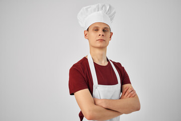 man in chef's uniform kitchen working profession