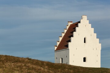 Fototapeta na wymiar The sand covered church in Skagen, Denmark