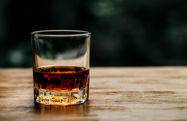glass of whiskey on the table