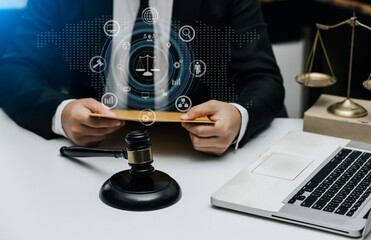 Concepts of Law and Legal services. Lawyer working with law interface icons. Blurred background.