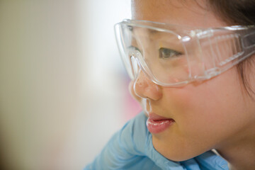Smiling girl student in laboratory classroom