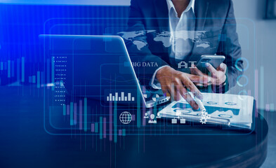Business hands working on network and digital finance marketing chart with future technology innovation and digital transformation concept.