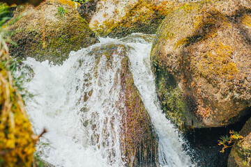 waterfall on the rocks with moss devon UK
