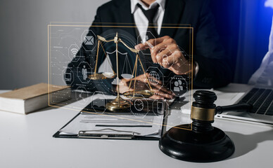 Concepts of Law and Legal services. Lawyer working with law interface icons. Blurred background.	