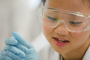 Smiling girl student in laboratory classroom