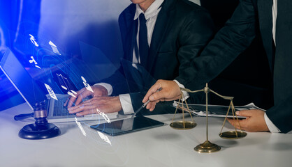 Concepts of Law and Legal services. Lawyer working with law interface icons. Blurred background.	
