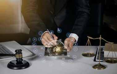 Concepts of Law and Legal services. Lawyer working with law interface icons. Blurred background.	