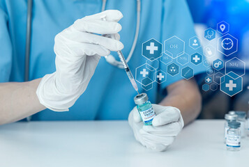 Fototapeta premium Medical doctor injecting coronavirus vaccine, COVID-19 vaccine, Medicine digital healthcare and connection on modern virtual screen. 