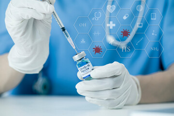 Medical doctor injecting coronavirus vaccine, COVID-19 vaccine, Medicine digital healthcare and connection on modern virtual screen. 
