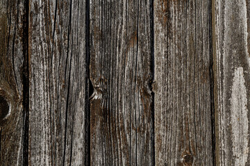 dark brown wooden wall made of dark planks vertical background