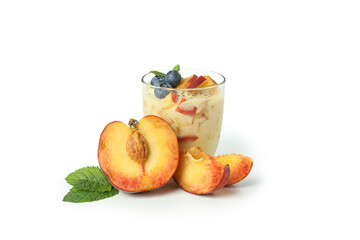 Jar with peach yogurt and ingredient isolated on white background