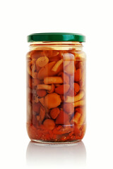 Pickled mushrooms in a glass jar.