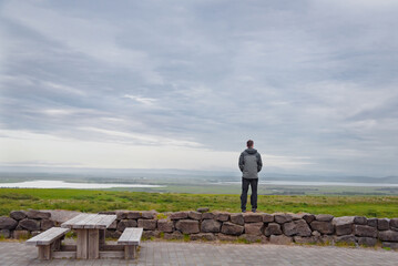 Traveller standing on the rocks