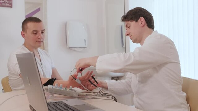 Patient nerves testing using electromyography at medical center