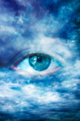 blue eye looking through the clouds