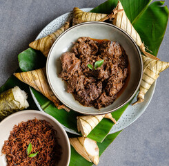 Popular food for breaking fast during Ramadan. Ramadan Food. Food like lemang, ketupat palas, beef and chicken rendang and serunding are commonly eaten together