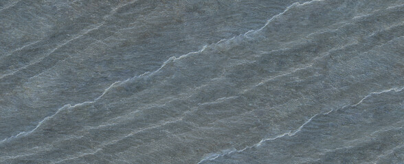 The texture of the stone wall. Close-up. Light gray rock backdrop