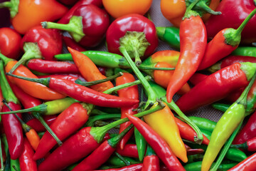 pattern of hot peppers closeup red and green, fresh vegetables