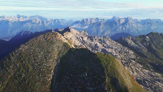 Morning flight around Krn mountain. Julian Alps, Soca valley, Slovenia
