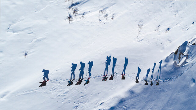 summit hiking activity of trained and conscious professional mountaineers © emerald_media