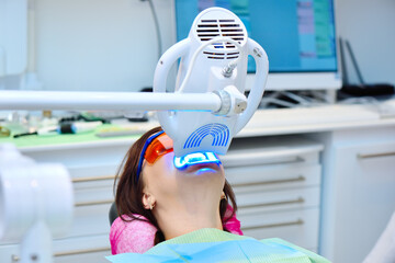 Laser bleaching teeth in clinic.