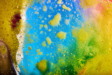 oil paint abstract figure sketch of bright colors on the canvas of a textured background