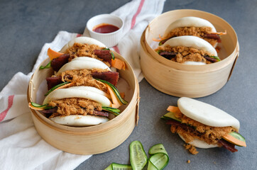 Delicious homemade snacks. Steamed Guo Bao with Meat Floss & Bakkwa aka Grilled Dried Meat. Great...