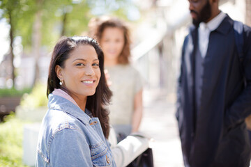 Portrait smiling, confident woman in sunny park