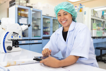 Picture of the scientists working in the laboratory and smiling, Concept science and technology, Science background