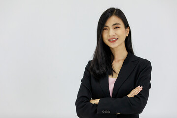 Isolated portrait studio shot of Asian young pretty smart confident happy professional success female businesswoman officer in black formal suit standing smiling look at camera on white background