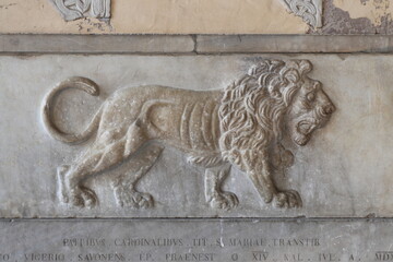 Ancient Stone Coffin Detail with Carved Lion at Santa Maria in Trastevere Church in Rome, Italy
