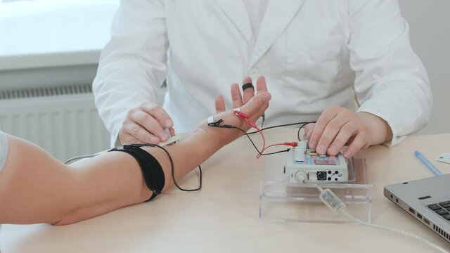 Patient nerves testing using electromyography at medical center