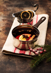 Christmas mulled wine on the table. Hot wine with spices and spicy. Festive background