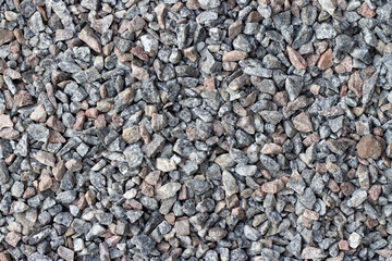 Decorative gray and white pebble stones as background. High quality photo