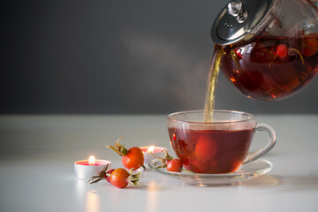 rosehip tea on white table in kitchen