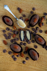 dates covered with chocolate and stuffed with marzipan 