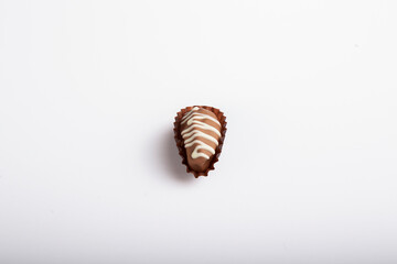 date dessert dipped in chocolate and garnished  Milk chocolate