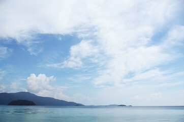 THAILAND, BANGKOK: Scenic landscape view of isolated Thai island with palms and traditional houses