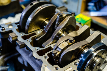 3-cylinder engine block with crankshaft. near view