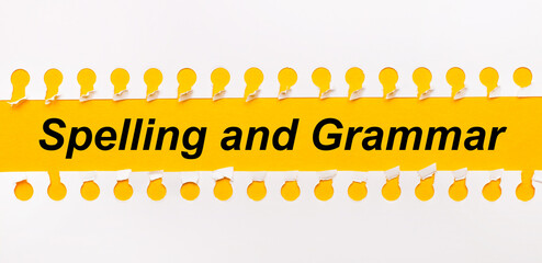 Torn paper strip on yellow background with text SPELLING AND GRAMMAR