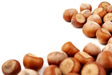 Group of hazelnuts, isolated on white background