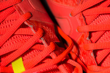 Closeup and crop of a pair of red sport shoes