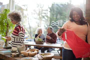 Senior women shopping at store